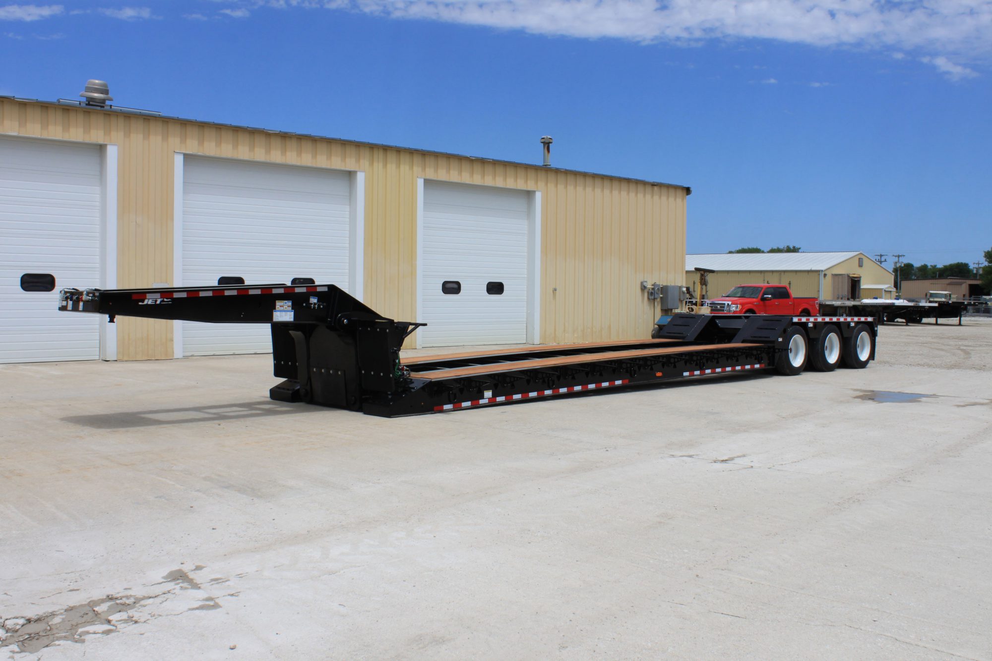 BlackTripleAxleLowboyTrailer Jet Co Trailers