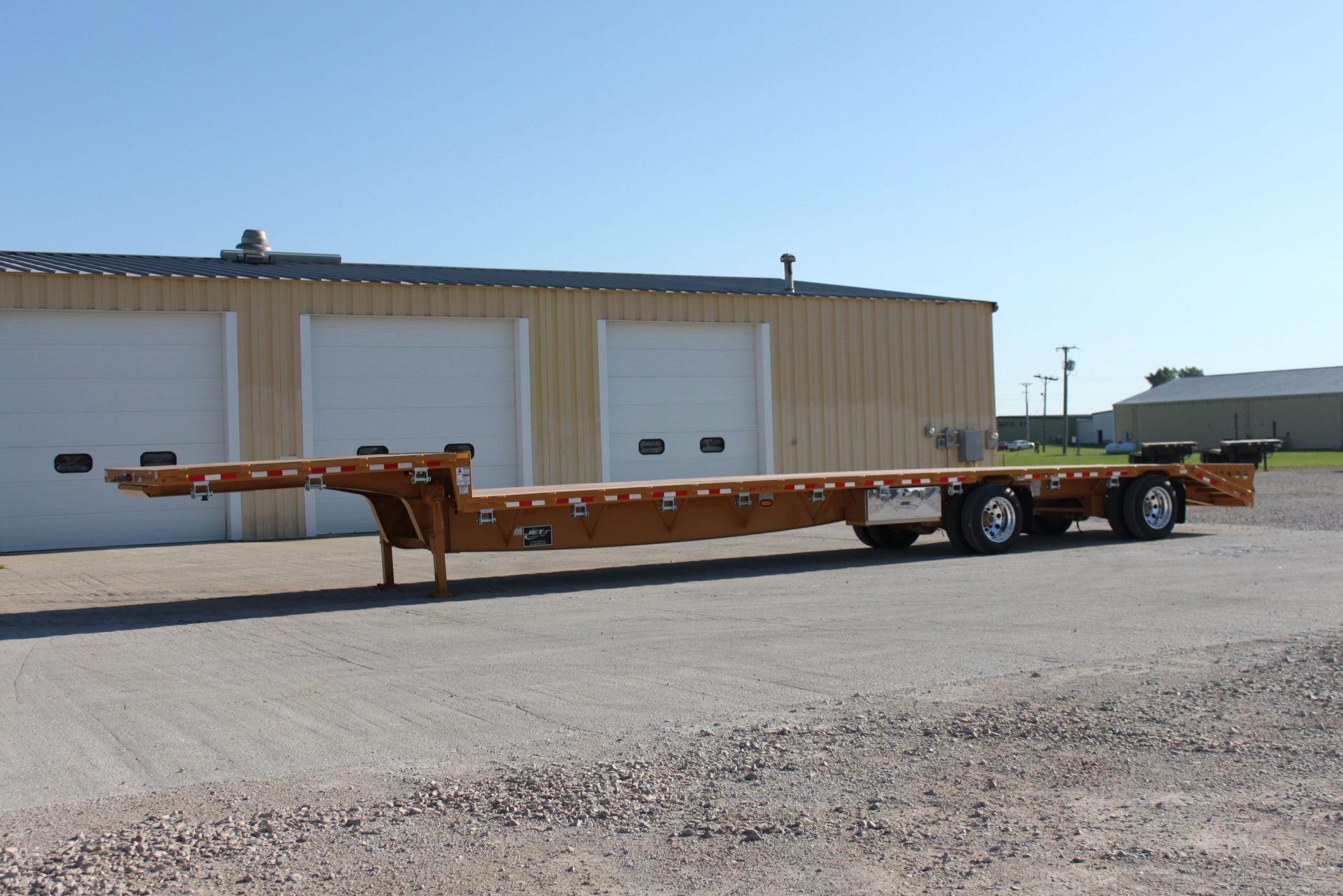 DropDeckTrailerSteelYellowTandemSpreadAxlewithBeavertailandRamps Jet Co Trailers