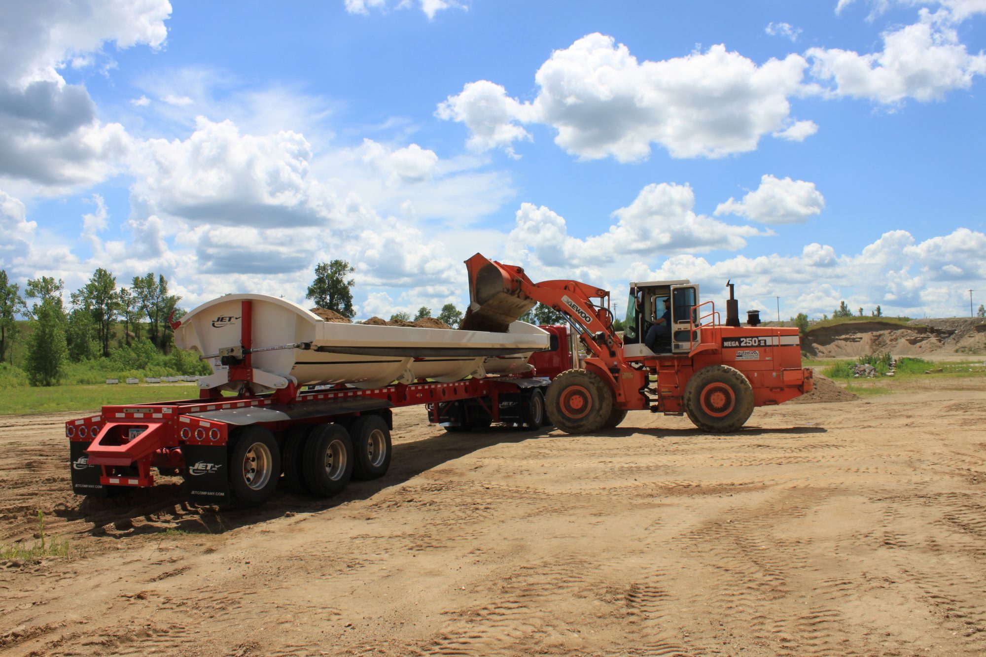 sidedumptrailerloadedwheelloader Jet Co Trailers
